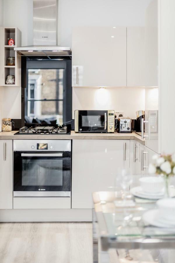 Bright & Modern 2-Bed Notting Hill Apartment ลอนดอน ภายนอก รูปภาพ